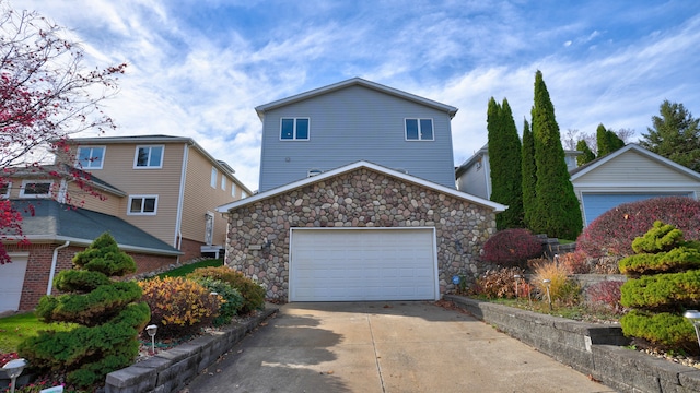 front of property with a garage