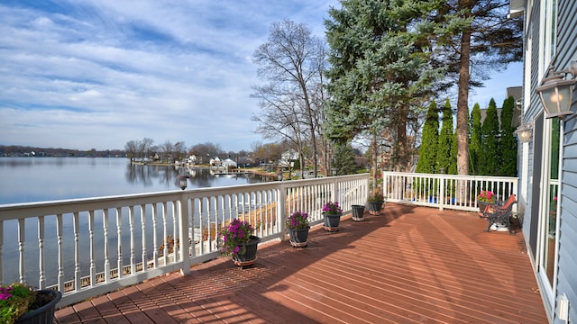 deck featuring a water view