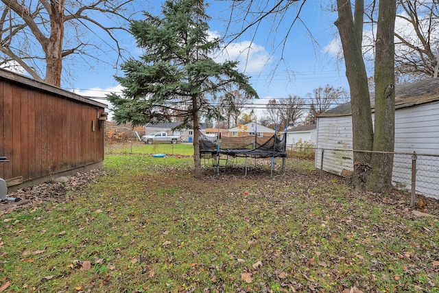 view of yard featuring a trampoline