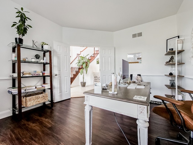 office space featuring dark wood-type flooring