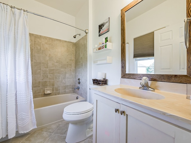 full bathroom with tile patterned floors, shower / tub combo with curtain, vanity, and toilet