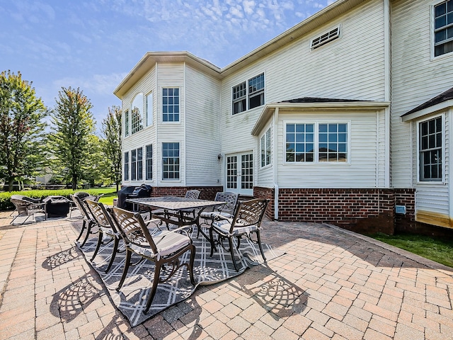 view of patio featuring a grill