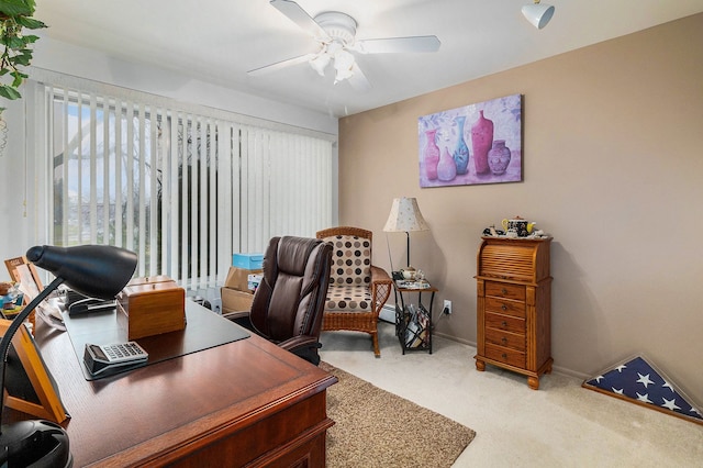 home office featuring ceiling fan and light colored carpet