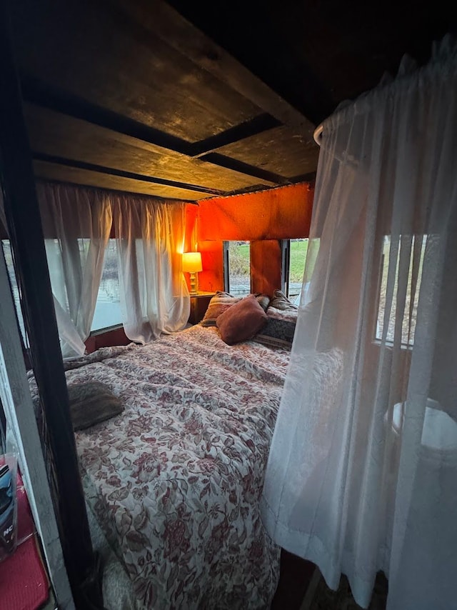 bedroom featuring multiple windows