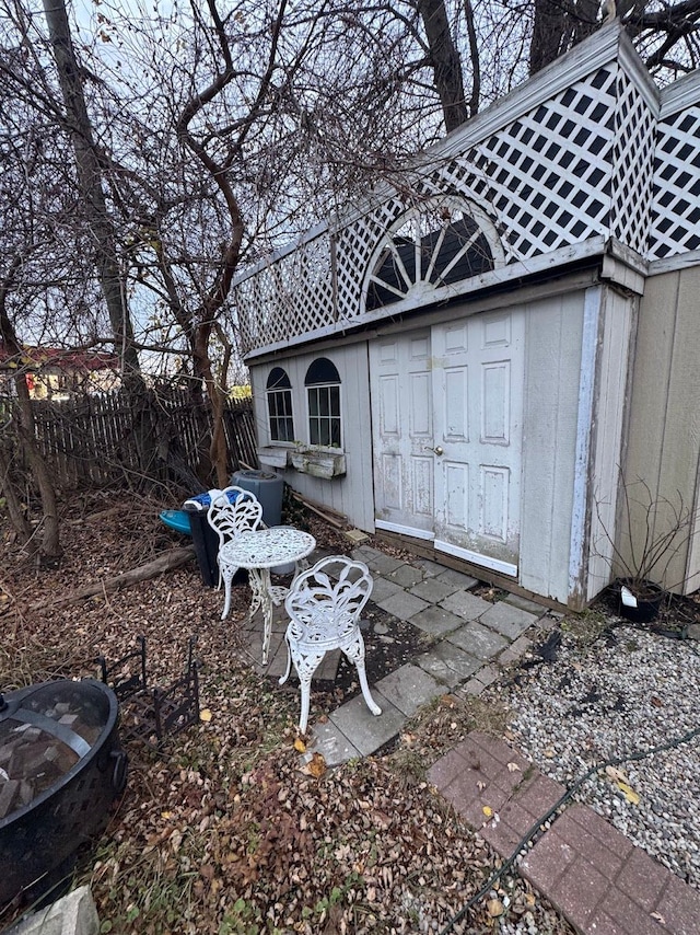 view of patio with an outdoor structure