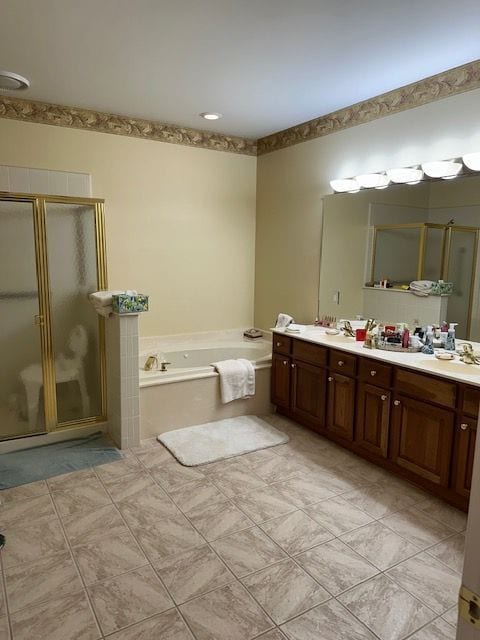 bathroom with plus walk in shower and vanity