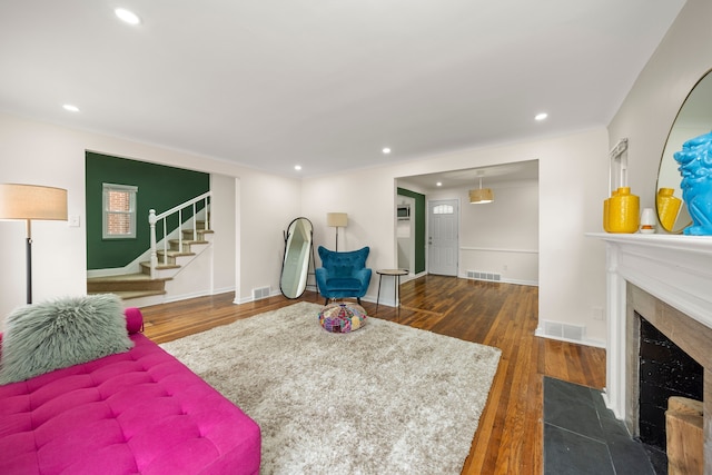 living room with dark hardwood / wood-style floors