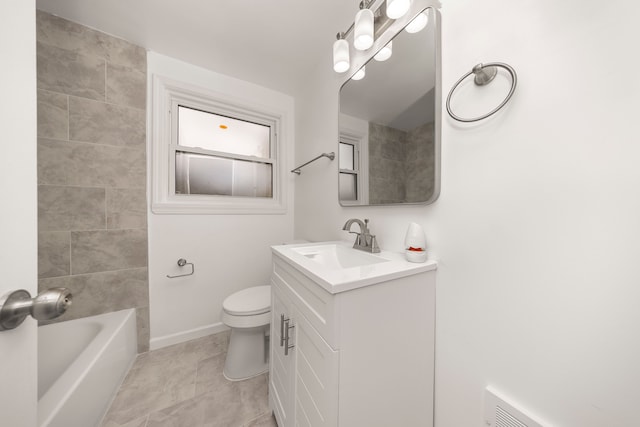 full bathroom featuring shower / washtub combination, vanity, and toilet