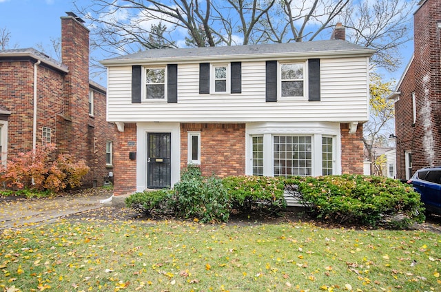 view of front of house with a front lawn