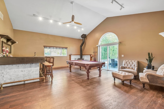 playroom with rail lighting, ceiling fan, indoor bar, billiards, and hardwood / wood-style floors