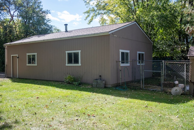 view of home's exterior with a yard