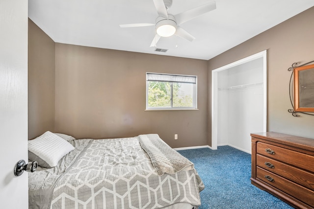 carpeted bedroom with a closet and ceiling fan