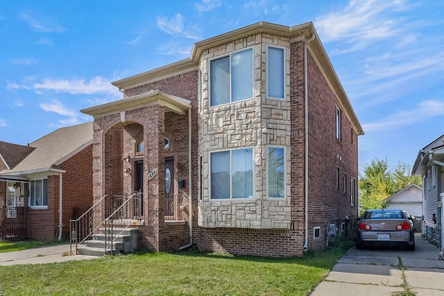 view of front facade with a front lawn