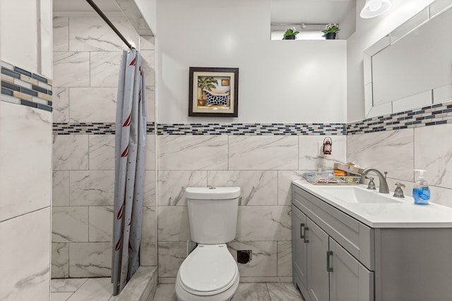 bathroom with a shower with curtain, toilet, tile walls, and vanity