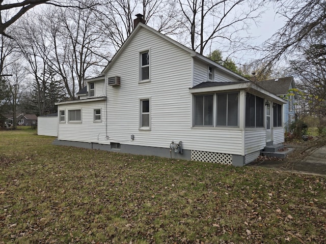 25438 4th St, Grosse Ile, MI 48138 - rear view of house with a sunroom, a wall mounted AC, a yard, and a shingled roof