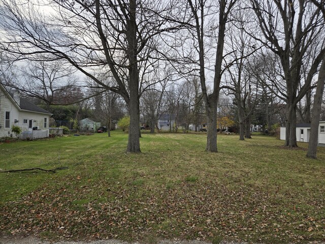 25438 4th St, Grosse Ile, MI 48138 - view of green lawn