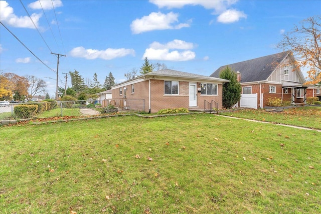 view of front of property with a front lawn