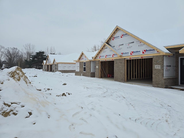 view of yard layered in snow