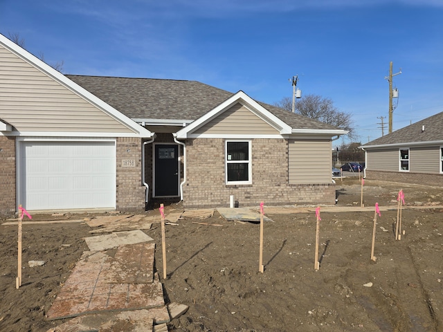 18750 14 Mile Rd, Roseville, MI 48066 - ranch-style house featuring a shingled roof, an attached garage, and brick siding