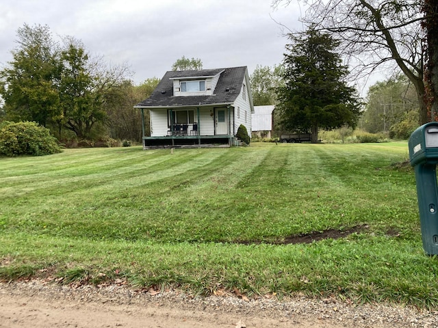 view of yard with a porch