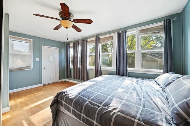 bedroom featuring ceiling fan and light wood-type flooring