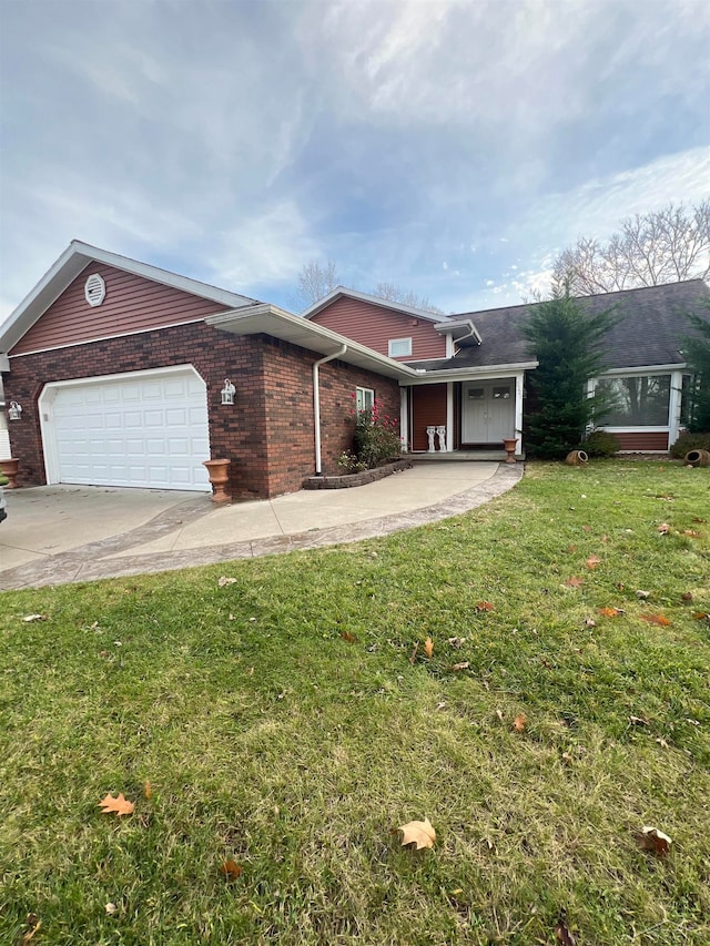 ranch-style home with a front yard and a garage