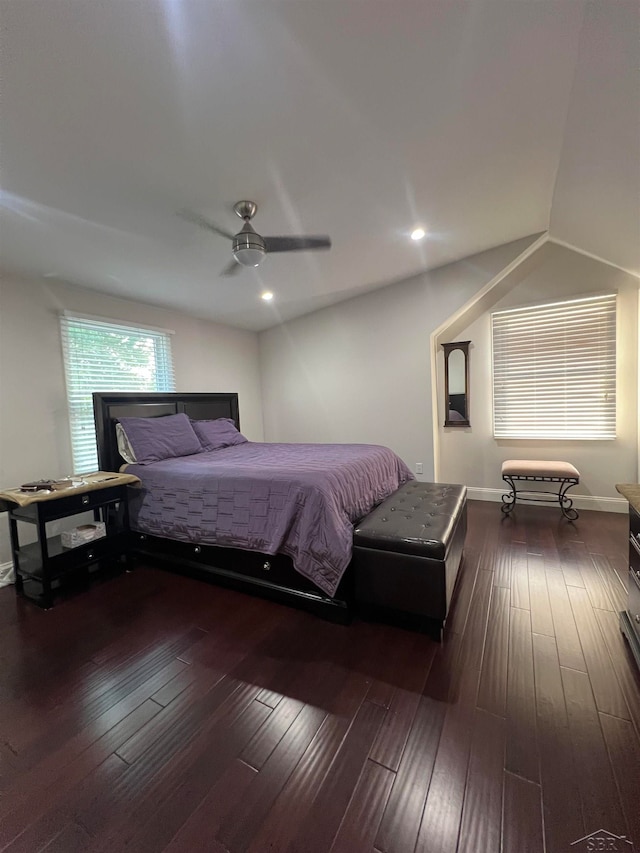 bedroom featuring lofted ceiling, ceiling fan, and dark wood-type flooring