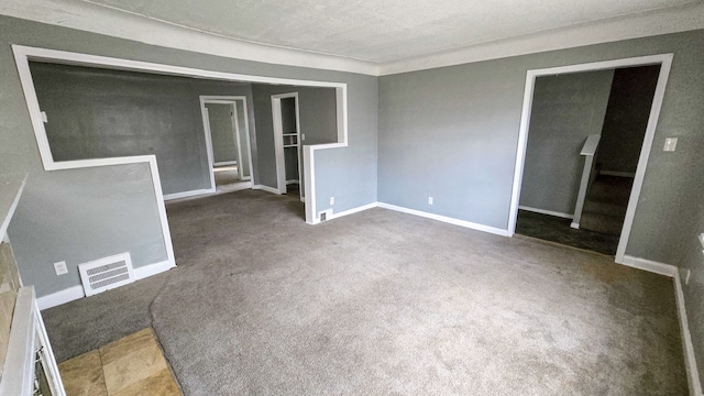 unfurnished bedroom featuring carpet