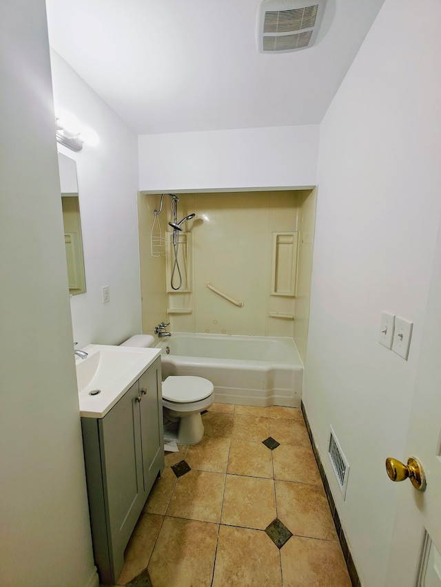 full bathroom featuring tile patterned floors, vanity, toilet, and shower / washtub combination