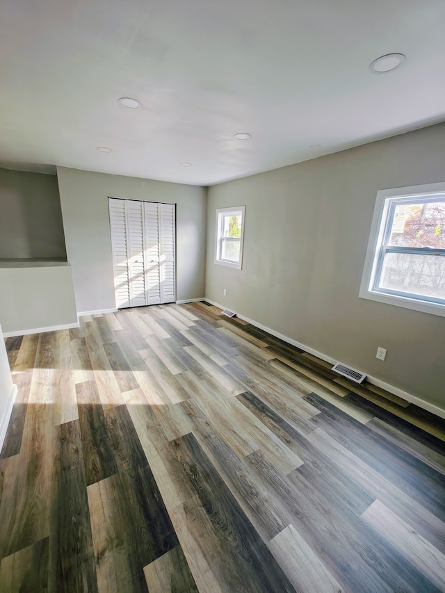 unfurnished room featuring light wood-type flooring