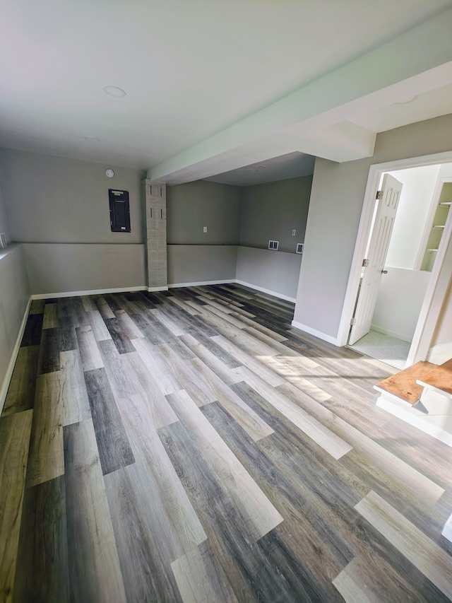 basement featuring light wood-type flooring