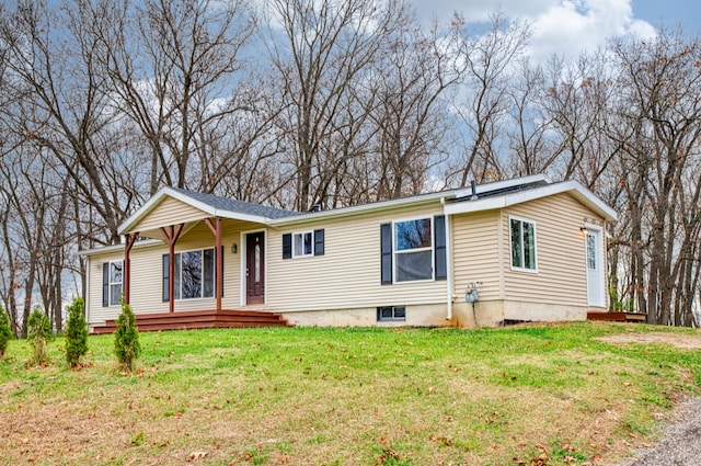 view of front of house with a front lawn