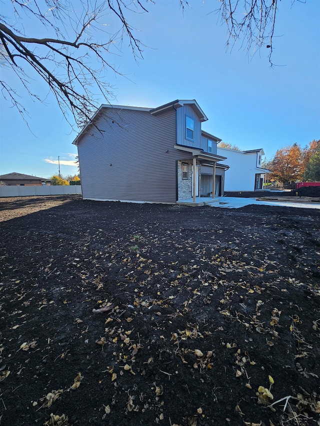 rear view of house featuring a patio area