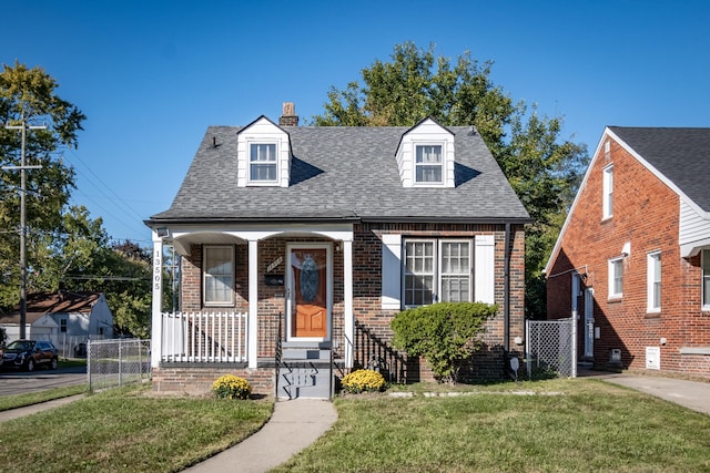 view of front of home with a front yard