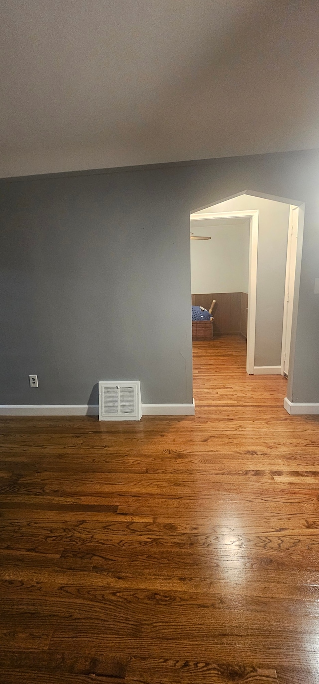 spare room featuring hardwood / wood-style flooring