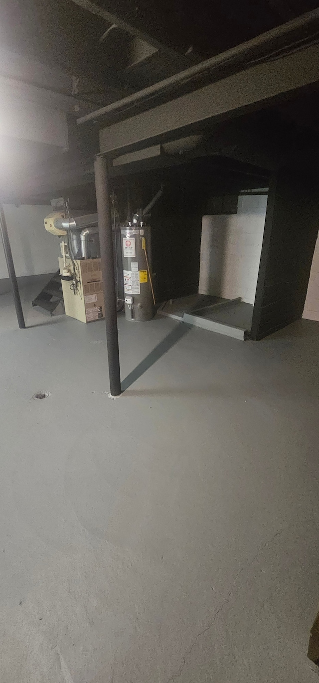 basement featuring water heater