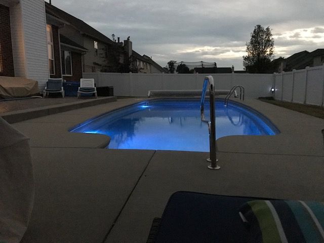 view of pool with a patio area and central AC