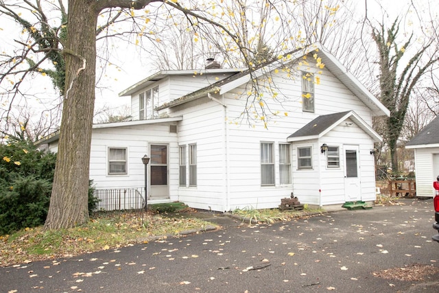 56453 M-51, Dowagiac, MI 49047 - view of front of property with a chimney