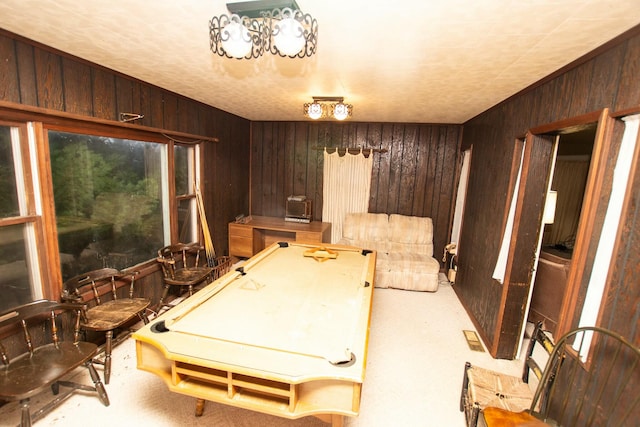 recreation room with carpet flooring, billiards, and wood walls