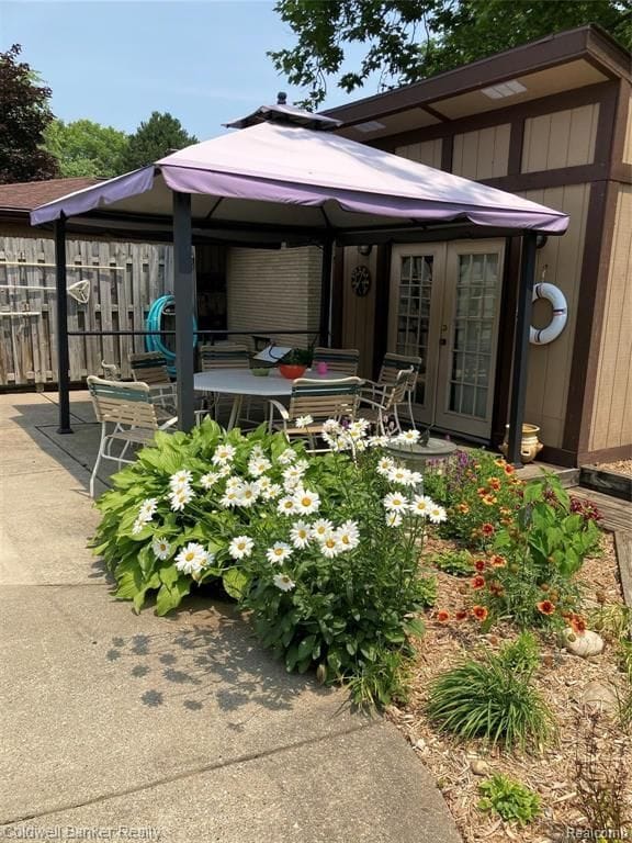 view of patio featuring a gazebo and french doors