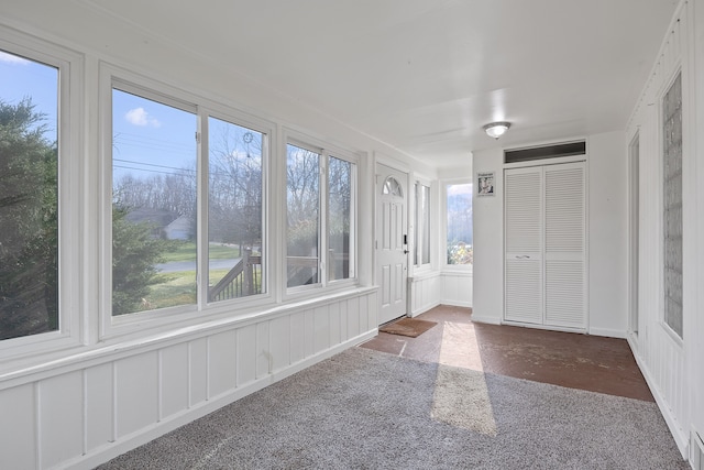 unfurnished sunroom with a healthy amount of sunlight