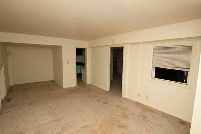 interior space with light colored carpet