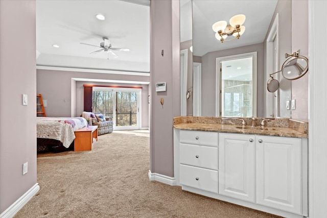 bathroom featuring vanity and ceiling fan