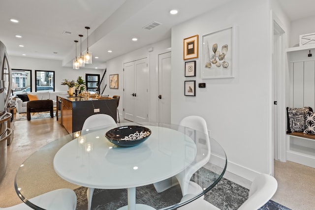 dining area featuring sink