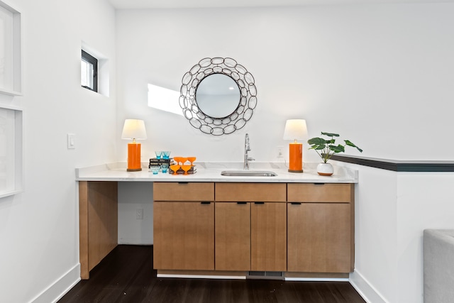 interior space featuring dark hardwood / wood-style floors and sink