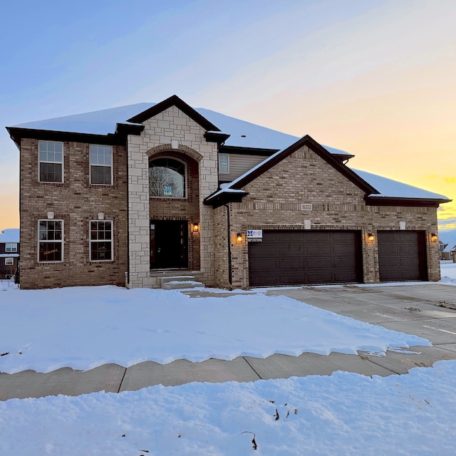 view of front of property with a garage