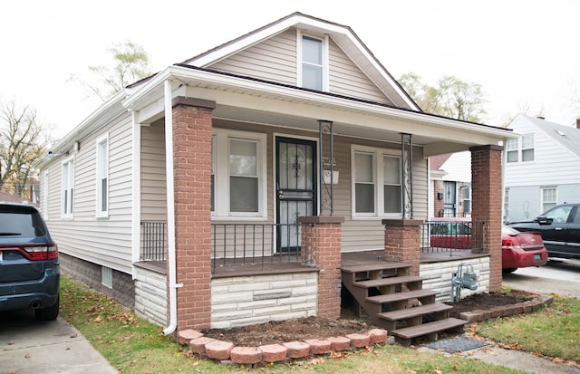 bungalow-style home featuring covered porch