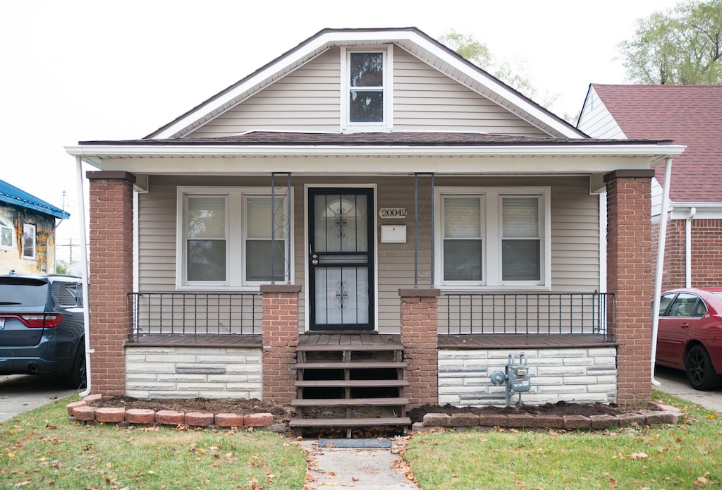 bungalow-style home featuring a porch