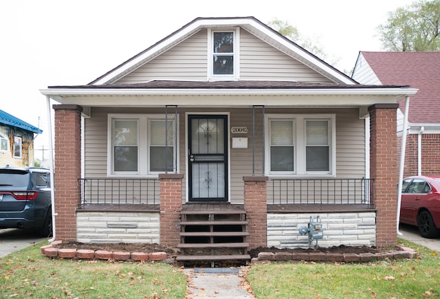 bungalow-style home featuring a porch