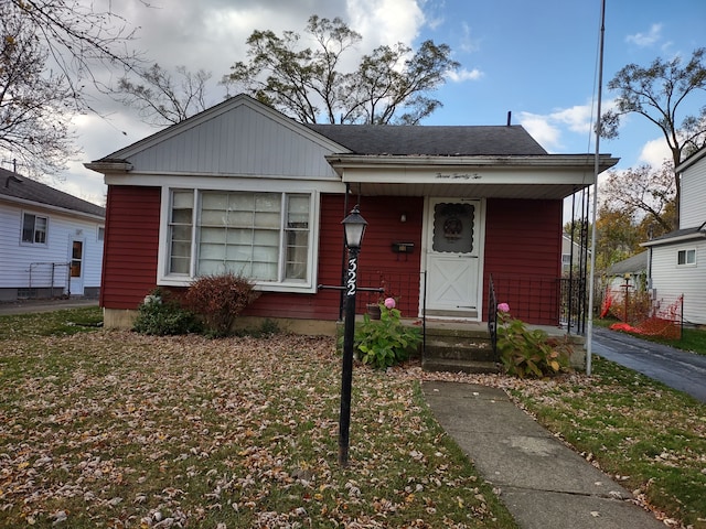 bungalow with a front yard